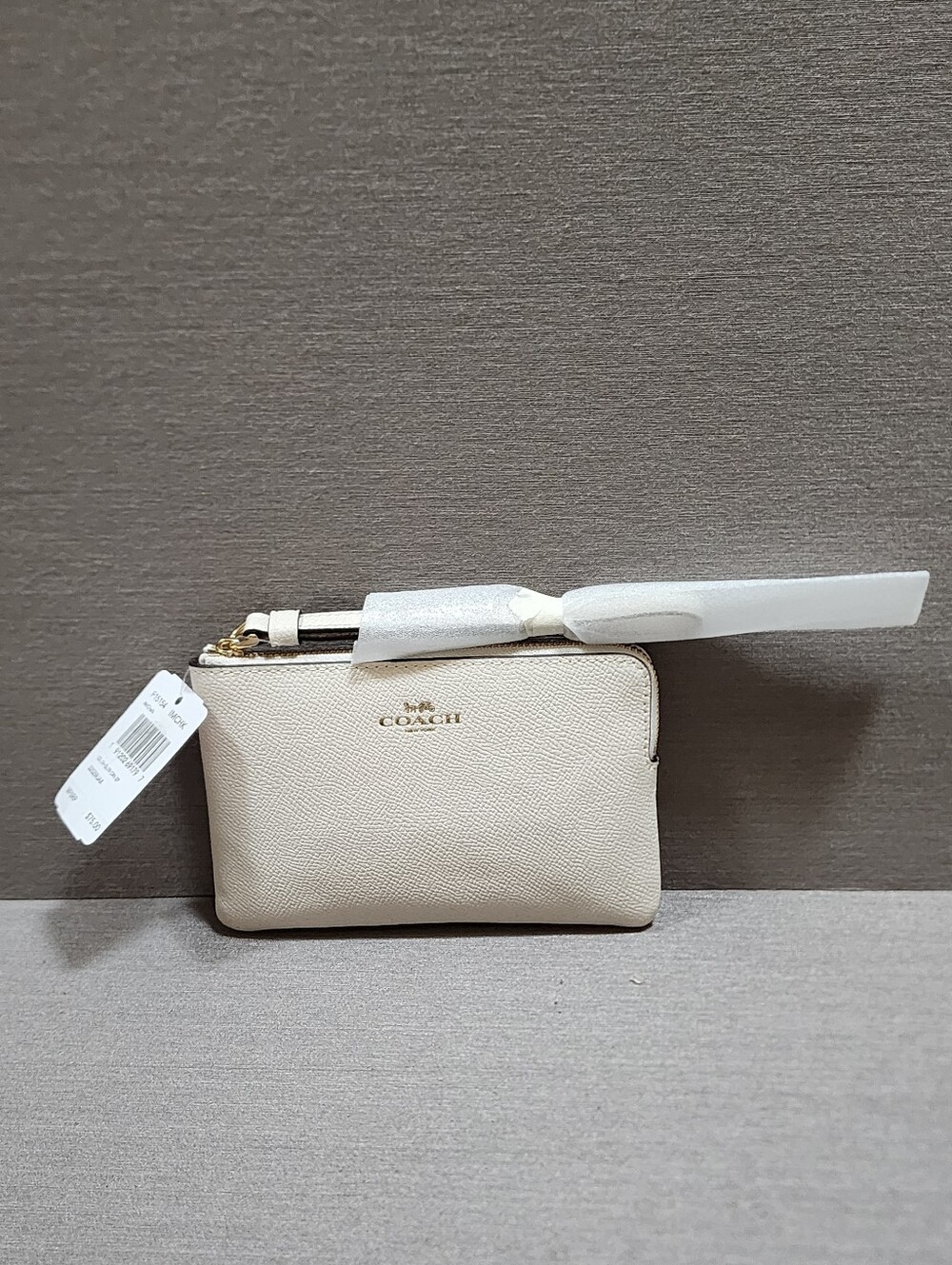 COACH CREAM WRISTLET NEW WITH TAG, CARD, AND ORIGINAL STUFFING, WRAP GREAT GIFT
